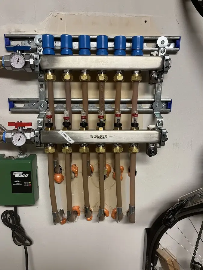 Plumber performing Water Heater Repair at a residential property in Montague